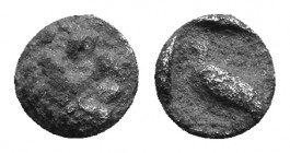 Caria. Mylasa circa 420-390 BC. Tetartemorion. Forepart of roaring lion left, head turned back / Bird standing right, pellets flanking, all wihtin inc...