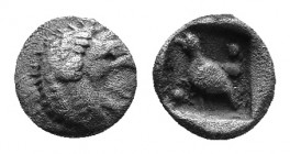 Caria. Mylasa circa 420-390 BC. Tetartemorion. Forepart of roaring lion left, head turned back / Bird standing right, pellets flanking, all wihtin inc...