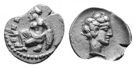 Cilicia. Tarsos. Tiribazos, Satrap of Lydia 388-380 BC. Obol AR 10 mm., 0,63 g. Female kneeling left, tossing astragaloi / Male head right. very fine ...