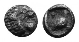 Caria. Mylasa circa 420-390 BC. Tetartemorion. Forepart of roaring lion right / Bird standing right, pellets flanking, all wihtin incuse square. AR 0....