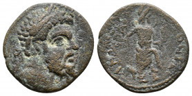 Pisidia. Antioch. Septimius Severus AD 193-211. Laureate and draped bust right / Mên standing right, with foot on bucranium, holding sceptre and crown...