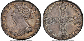 Anne Shilling 1702 MS63 NGC, KM509.3, S-3583. A choice specimen showcasing glossy surfaces adorned in amber toning. Hints of emerald patination emerge...