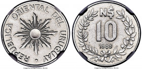 Republic 10 Nuevos Pesos 1989 MS64 NGC, KM93. A near-gem specimen with crisp devices emphasized by the sharp design style and the glistening fields. 
...