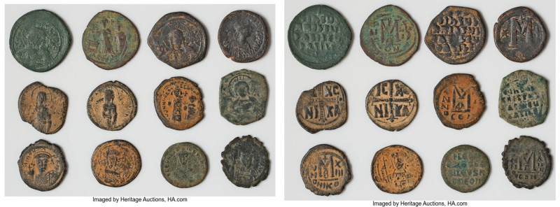 ANCIENT LOTS. Byzantine. Lot of twelve (12) AE folles. Choice Fine-Choice VF. In...