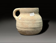 Ceramic jug with handle from the iron age period circa 1200 – 800 BC
Height: 12 cm