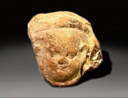 ceramic head of Eros, hellenistic ca 300 - 100 BC
Height: 3.6 cm