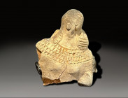 ceramic figurine of a female, carrying her infant chlid, near east ca 1000 BC
Height: 10.5 cm