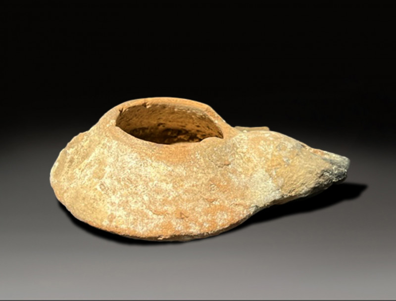 ceramic oil lamp islamic period circa 700 - 1000 AD
Height: 10.3 cm