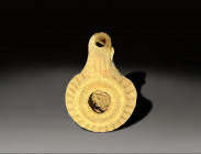 ceramic ribbed oil lamp, hellenisitic period circa 300 - 100 BC
Height: 9.5 cm