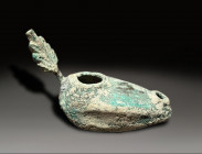 bronze oil lamp with leaf handle roman period 100 – 400 AD
Height: 12 cm