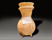 glass perfume jar standing on three legs, roman period circa 200 - 400 AD
Height: 8.2 cm
