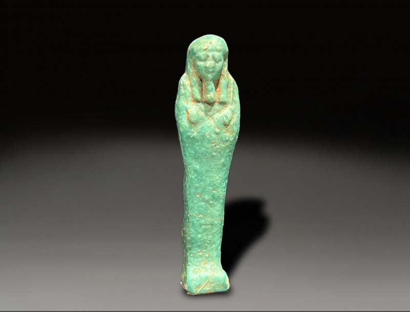 Egyptian blue faience ushabti Egyptian period circa 600 – 300 BC
Height: 9.1 cm...
