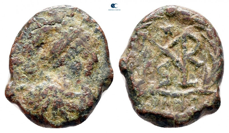 Marcian AD 450-457. Constantinople
Nummus Æ

12 mm, 1,40 g



fine