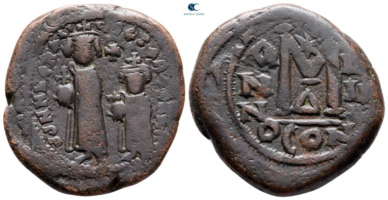 Heraclius with Heraclius Constantine AD 610-641. Constantinople
Follis or 40 Nu...