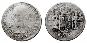 MONARQUÍA ESPAÑOLA
CARLOS III
2 Reales. AR. Potosí PR. 1777. 6,21 g. Cal.1388. Concreciones limpiadas, si no BC. Escasa.