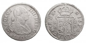 MONARQUÍA ESPAÑOLA
CARLOS IV
2 Reales. AR. Sevilla CN. 1801. 5,89 g. Cal.1065. MBC-.