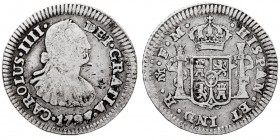 MONARQUÍA ESPAÑOLA
CARLOS IV
1/2 Real. AR. Méjico FM. 1797. 1,61 g. Cal.1291. Rayitas junto a la barbilla, si no MBC.