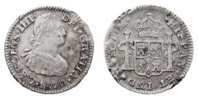MONARQUÍA ESPAÑOLA
CARLOS IV
1/2 Real. AR. Méjico FM. 1800. 1,67 g. Cal.1294. Sirvió de joya, si no MBC-.