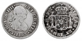 MONARQUÍA ESPAÑOLA
CARLOS IV
1/2 Real. AR. Méjico FT. 1803. 1,64 g. Cal.1298. Pátina oscura en rev. MBC.