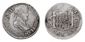 MONARQUÍA ESPAÑOLA
FERNANDO VII
1/2 Real. AR. Guatemala M. 1821. 1,65 g. Cal.1294. Ligeramente descentrada y vano de cuño, si no MBC+. Escasa.