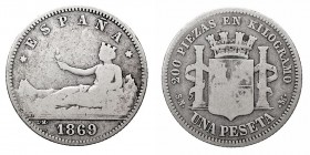 CENTENARIO DE LA PESETA
GOBIERNO PROVISIONAL
Peseta. AR. 1869 SNM. Leyenda ESPAÑA. Cal.15. BC-.