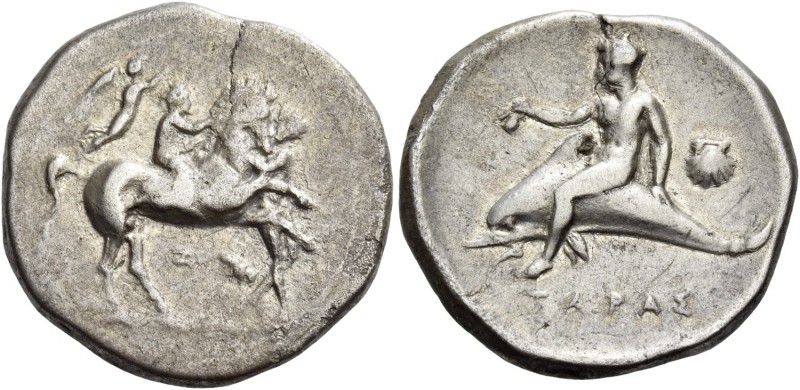 Calabria, Tarentum. Nomos circa 340-335 BC, AR 7.40 g. Horse rearing r., restrai...