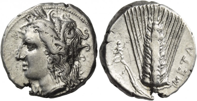 Metapontum. Nomos circa 330-290 BC, AR 7.86 g. Head of Demeter l., wearing earri...