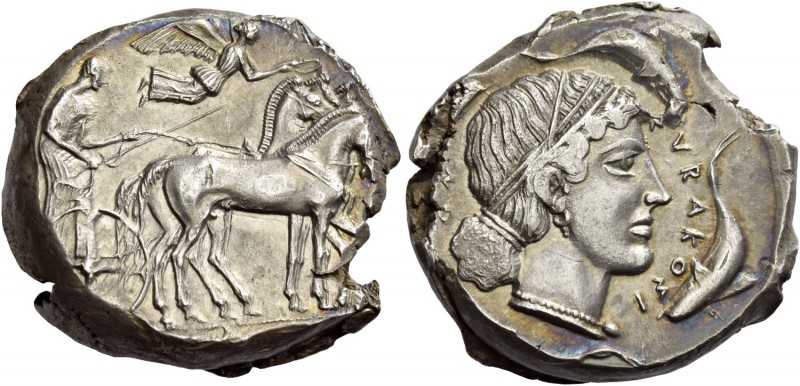 Syracuse. Tetradrachm circa 460-440 BC, AR 17.25 g. Slow quadriga driven r. by c...