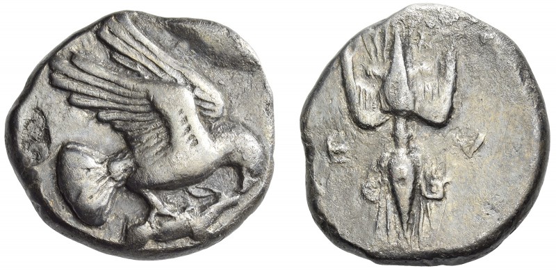 Elis, Olympia. Stater circa 450-440 BC, AR 11.46 g. Eagle flying r., grasping ra...