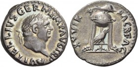 Vitellius, January – December 69. Denarius late April-December 69, AR 2.85 g. Laureate head r. Rev. Dolphin set over tripod; below, raven r. C 111. RI...