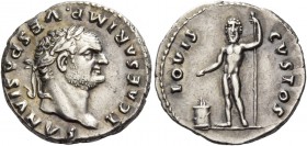 Titus, caesar 69 – 79. Denarius 76, AR 3.17 g. Laureate head r. with slight beard. Rev. Jupiter standing l., head facing, holding patera in r. hand ov...