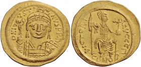 Justin II, 565 – 578. Solidus 565-578, AV 4.47 g. Helmeted, pearl-diademed and cuirassed bust facing, holding globus surmounted by Victory and ornamen...