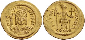 Justin II, 565 – 578. Solidus 565-578, AV 4.50 g. Helmeted, pearl-diademed and cuirassed bust facing, holding globus surmounted by Victory and ornamen...
