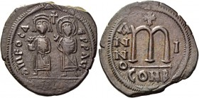 Phocas, 23 November 602 – 5 October 610. Follis 602-603, Æ 13.54 g. Phocas and Leontia standing facing, the Emperor holding globus cruciger, the Empre...