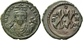 Phocas, 23 November 602 – 5 October 610. Half follis, Antiochia 608-609, Æ 4.66 g. Crowned and mantled bust facing, holding mappa and eagle- tipped sc...
