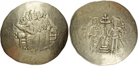 John II Comnenus, August 1118-April 1143, with colleagues from 1119. Aspron trachy 1118-1122, EL 2.44 g. Christ, nimbate, seated facing on backless th...