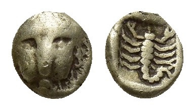 Caria. Mylasa 560-545 BC. 1/48 Stater EL (4.8mm, 0.1 g). Facing lion's head / Sc...