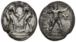 PAMPHYLIA, Aspendos. Circa 400-370 BC. AR Stater (24mm, 10.8 g). Two wrestlers grappling; AK between / Slinger to right; triskeles in field.