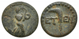 PISIDIA. Etenna. Ae (1st century BC). (15mm, 3.4 g) Obv: Female figure advancing right, head left, holding serpent; tilted amphora to left. Rev: ETEN....