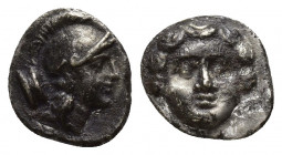 Greek Pisidia, Selge. Ca. 350-300 B.C. AR obol (9mm, 1 g). Helmeted head of Athena right; astralagos behind / Facing gorgoneion.