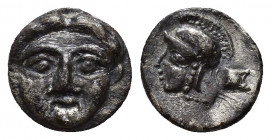 Greek Pisidia. Selge circa 350-300 BC. Obol AR (10mm, 0.7 g). Facing gorgoneion with protruding tongue / Head of Athena to left, wearing crested Attic...