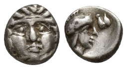Greek Pisidia, Selge, c. 350-300 BC. AR Obol (8.8mm, 1 g). Facing gorgoneion. R/ Helmeted head of Athena r.; astragalos to r.