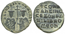 Constantine VII and Romanus I, with Zoe, Æ Follis. (24mm, 7.6 g) Constantinople, AD 914-919. +COҺSƮAҺƮ' CЄ ZOH, b', crowned facing busts of Constantin...