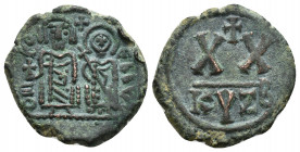 Phocas (602-610). Æ 20 Nummi (21mm, 5.8g). Cyzicus, 602/3. Full-length figures of Phocas and Leontia standing facing, holding globus cruciger and cruc...