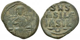 Anonymous (attributed to Constantine IX), c. 1042-1055. AE Follis Constantinople.(23mm, 8.6 g) Obv. Nimbate Christ seated facing on throne with back; ...