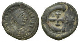 Justinian I. AD 527-565. Theoupolis (Antioch) Pentanummium Æ (14mm, 2 g). Diademed, draped, and cuirassed bust right / Large Є with central cross, sta...