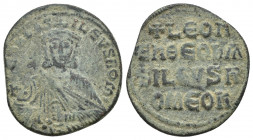 Leo VI the Wise. AD 886-912. Constantinople Follis Æ (22mm, 6.2 g). + LEON bASILEVS ROM star, Leo, crowned and wearing loros, seated facing on lyre-ba...