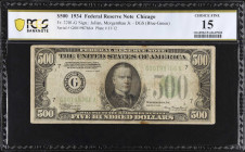 Fr. 2201-G. 1934 $500 Federal Reserve Note. Chicago. PCGS Banknote Choice Fine 15.
A circulated example of this Chicago dark green seal $500.
 Estim...