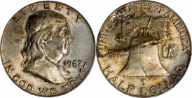 1962-D Franklin Half Dollar--Peeling Lamination Reverse--MS-63 (PCGS).
This visually stunning Mint error was almost certainly caused by an imperfecti...