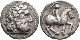 LOWER DANUBE. Uncertain tribe. Circa 3rd-2nd century BC. Tetradrachm (Silver, 24 mm, 13.21 g, 11 h), imitating Philip II of Macedon. Celticized laurea...
